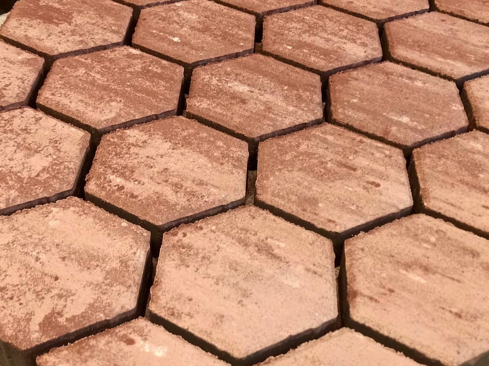 SUPER HEXAGON pavers in a warm terracotta colour mix
